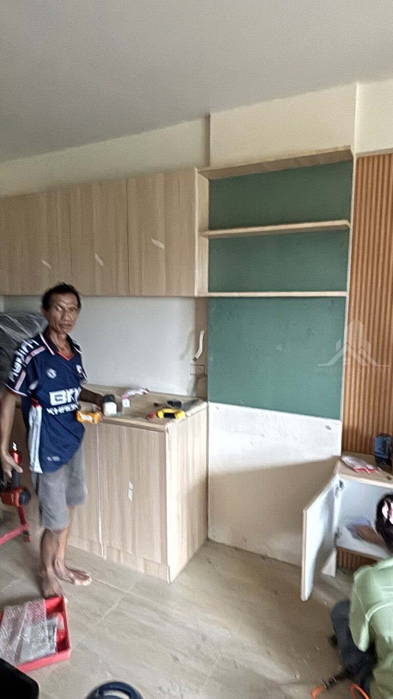 Built-in kitchen cabinets being installed at Chain Condominium, Jomtien